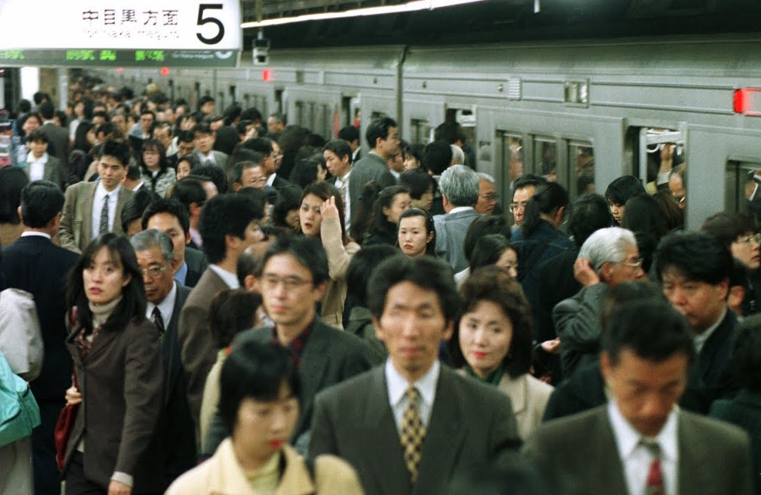 japanese people in a subway, crowded